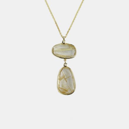 שרשרת זהב 14 קראט, תליון ובו שתי אבני "פולקי"רוטיל קוורץ זהובות,  בינהן יהלומים 0.04CT