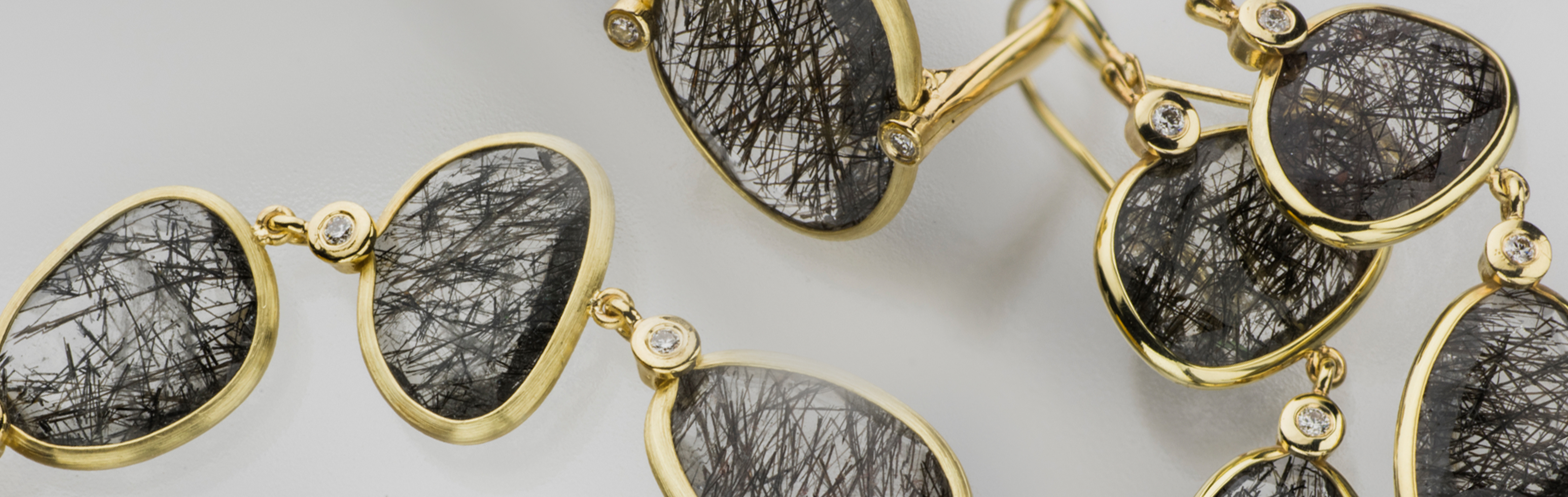 קולקציית סתיו שחור - תכשיטי זהב 14 קראט אבני רוטיל קוורץ ויהלום